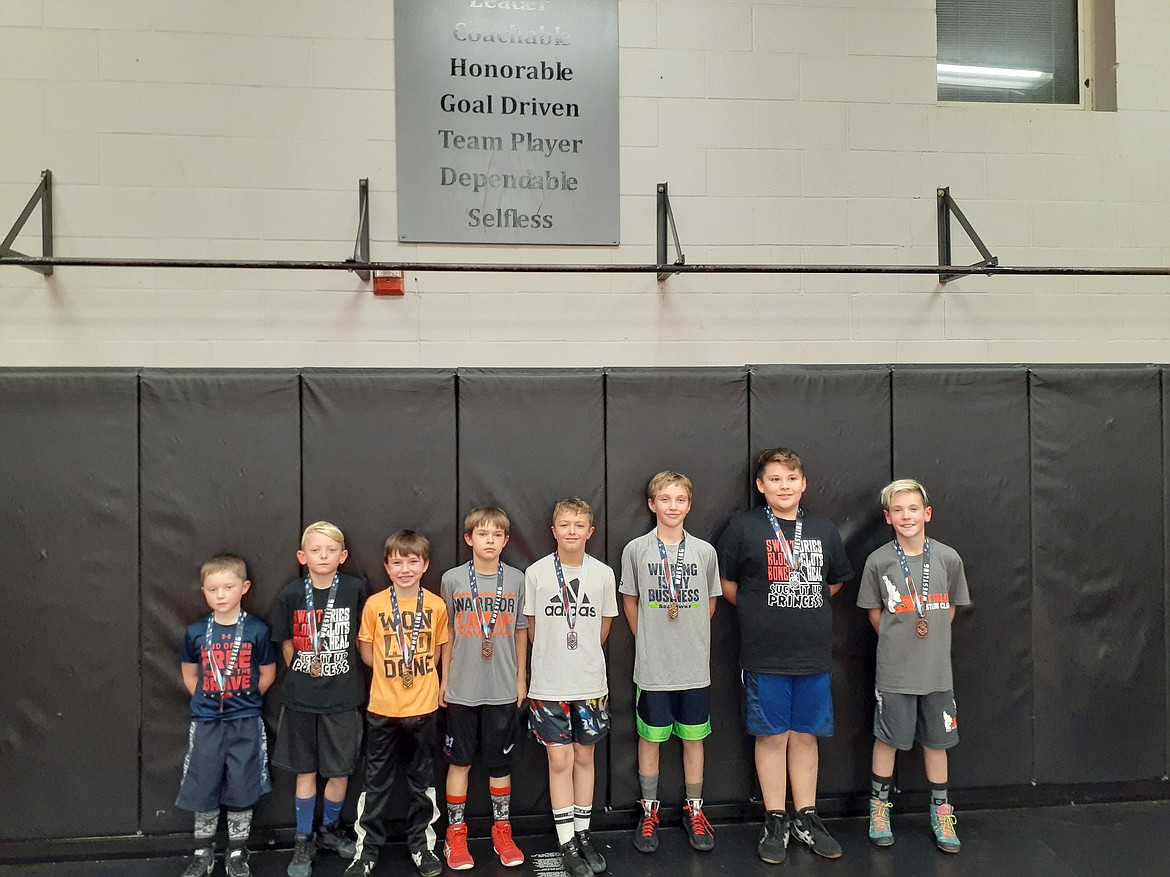 Courtesy photo
Post Falls Wrestling Club placers from a tournament in Bonners Ferry on Oct. 19 are, from left, Jason Anderson-3rd, Brandon Colglazier-3rd, Jude Rollan Zender-1st, Tristan Mendenhall-3rd, Ryker Allen-2nd, Kyle Washburn-1st, Wyatt Drywater-2nd and Grant Rigler-3rd. Wrestlers who also placed but are not pictured: Paxton Purcell-1st