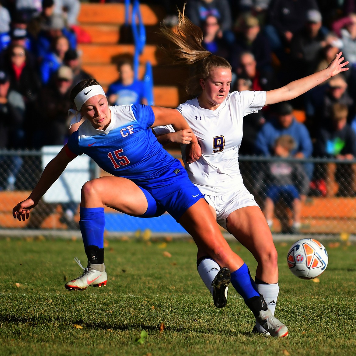 Josie Windaue battles with Laurel's Grace Wagner in the first half Friday. (Jeremy Weber photo))