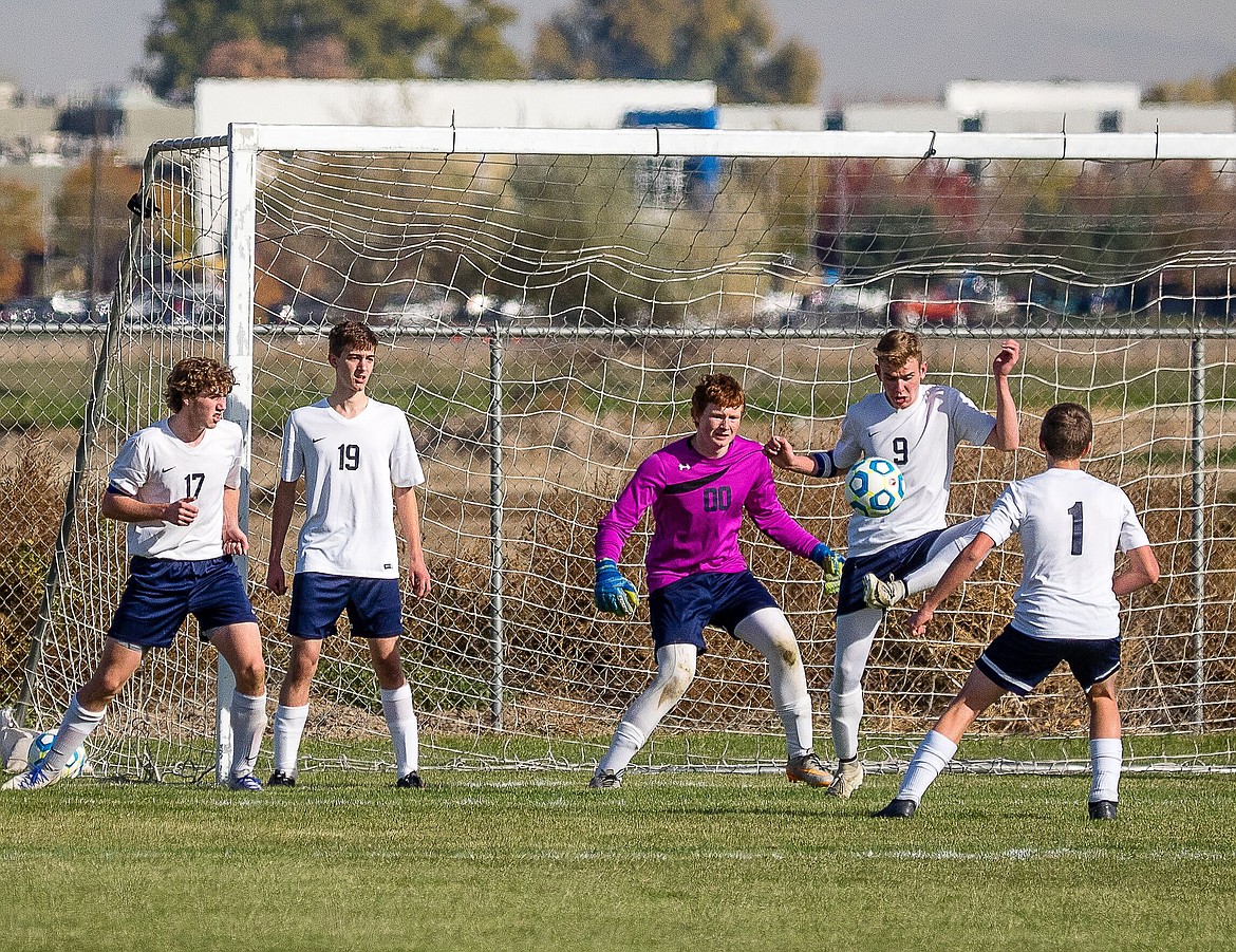 Photo by DOUG BEAZER
Ben Tompkins with the ball.