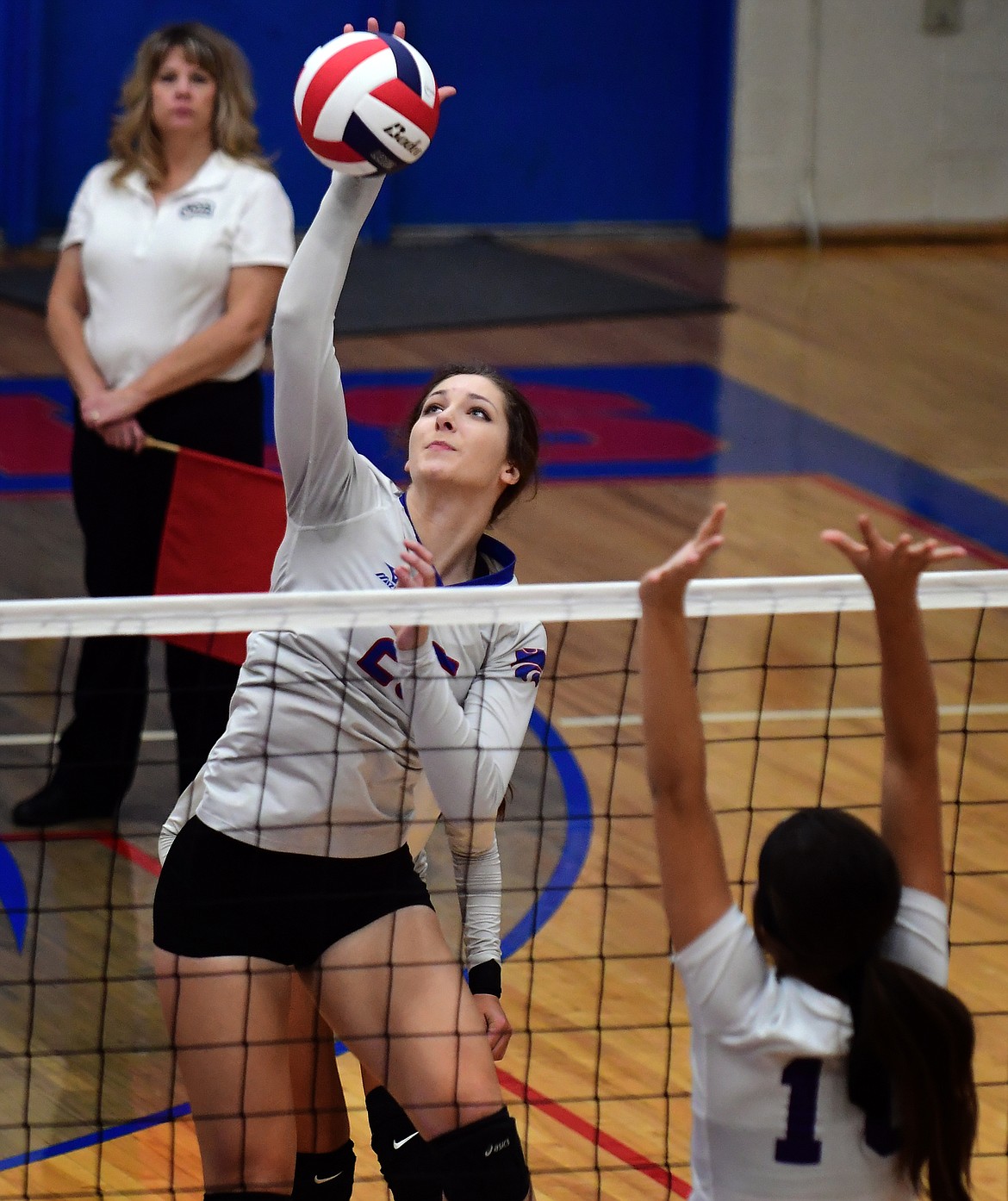 Kiera Brown goes up to attack the ball in the second set against Polson Tuesday. (Jeremy Weber photo)