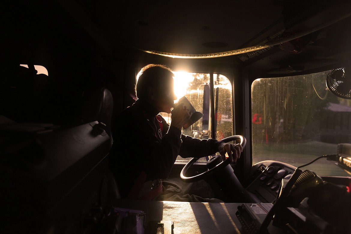 Bigfork volunteer firefighter Tom Pauley drives a fire engine to Bigfork Elementary School the morning of Oct. 11 for a Fire Prevention Week presentation.