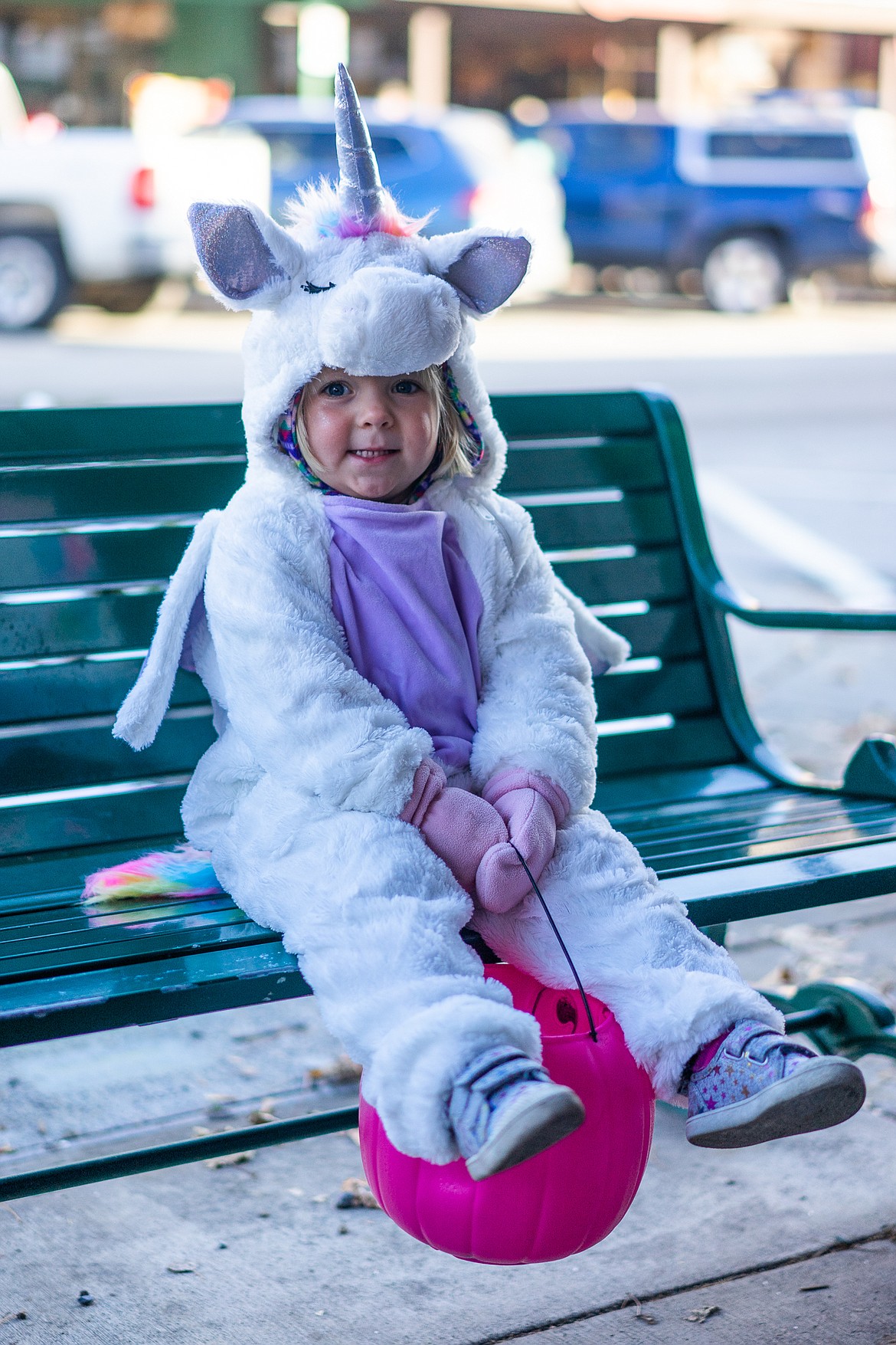 A unicorn smiles for the camera during the Whitefish Trick or Treat downtown on Thursday. (Daniel McKay/Whitefish Pilot)