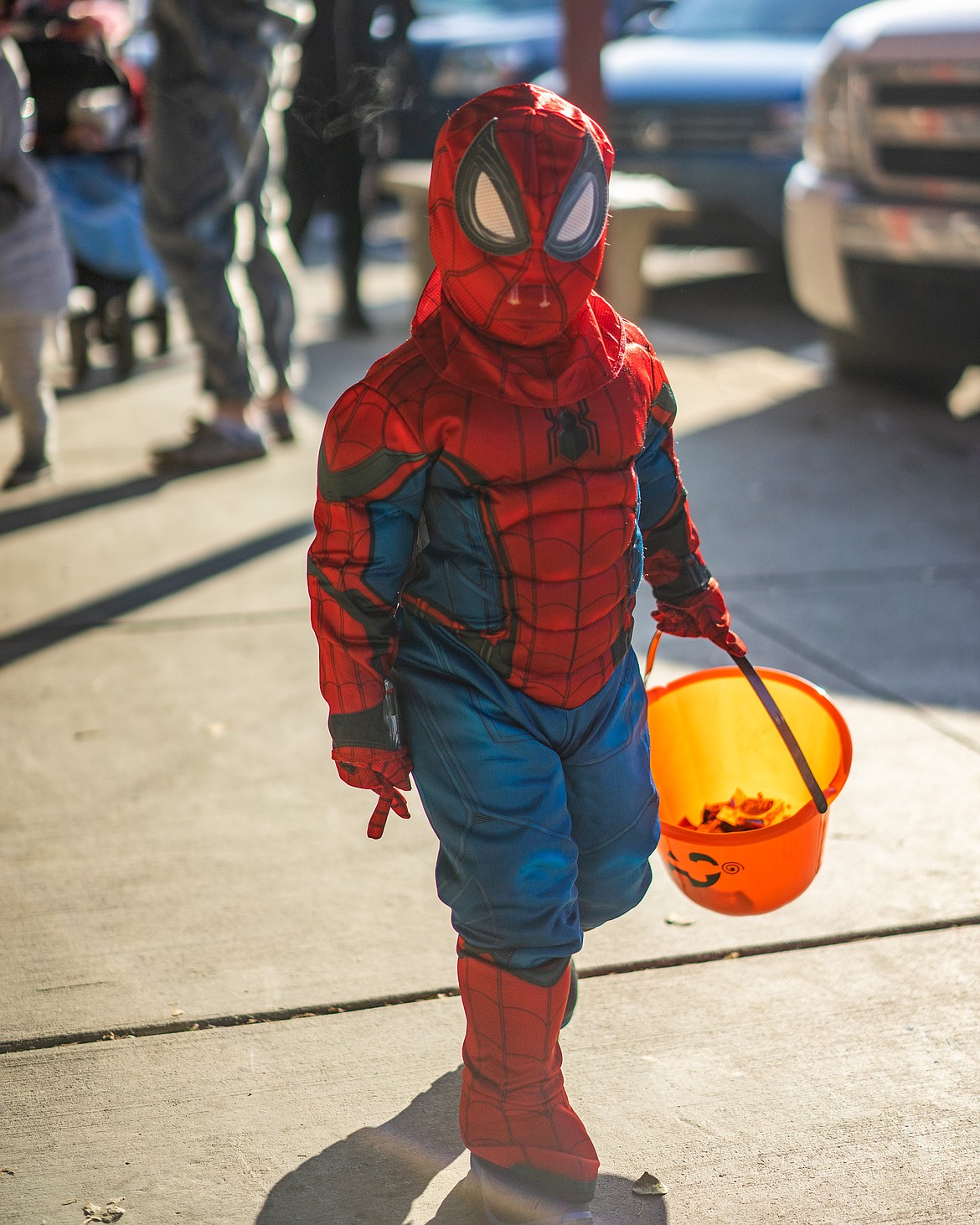 Spiderman prowls Central Avenue during the Whitefish Trick or Treat downtown on Thursday. (Daniel McKay/Whitefish Pilot)