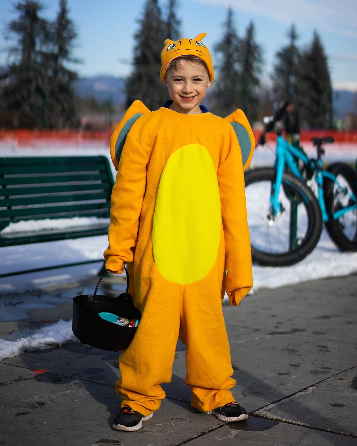 Charizard prepares to battle for candy during the Whitefish Trick or Treat downtown on Thursday. (Daniel McKay/Whitefish Pilot)