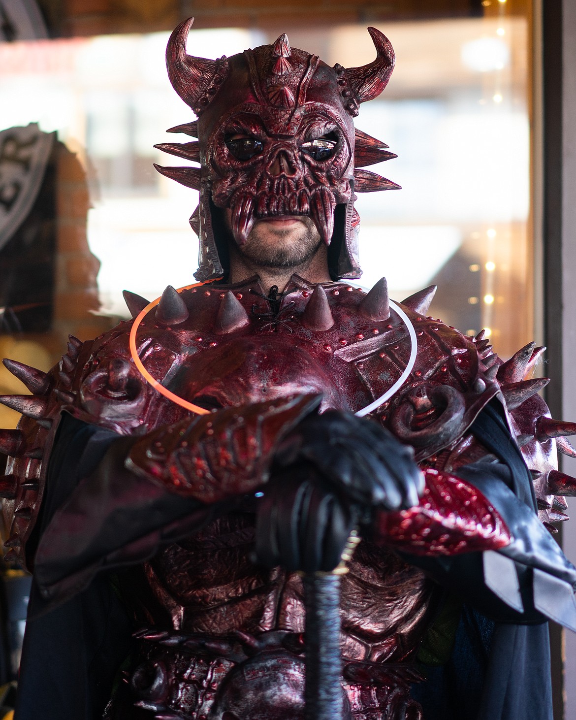 A scary warrior guards Montana Coffee Traders during the Whitefish Trick or Treat downtown on Thursday. (Daniel McKay/Whitefish Pilot)