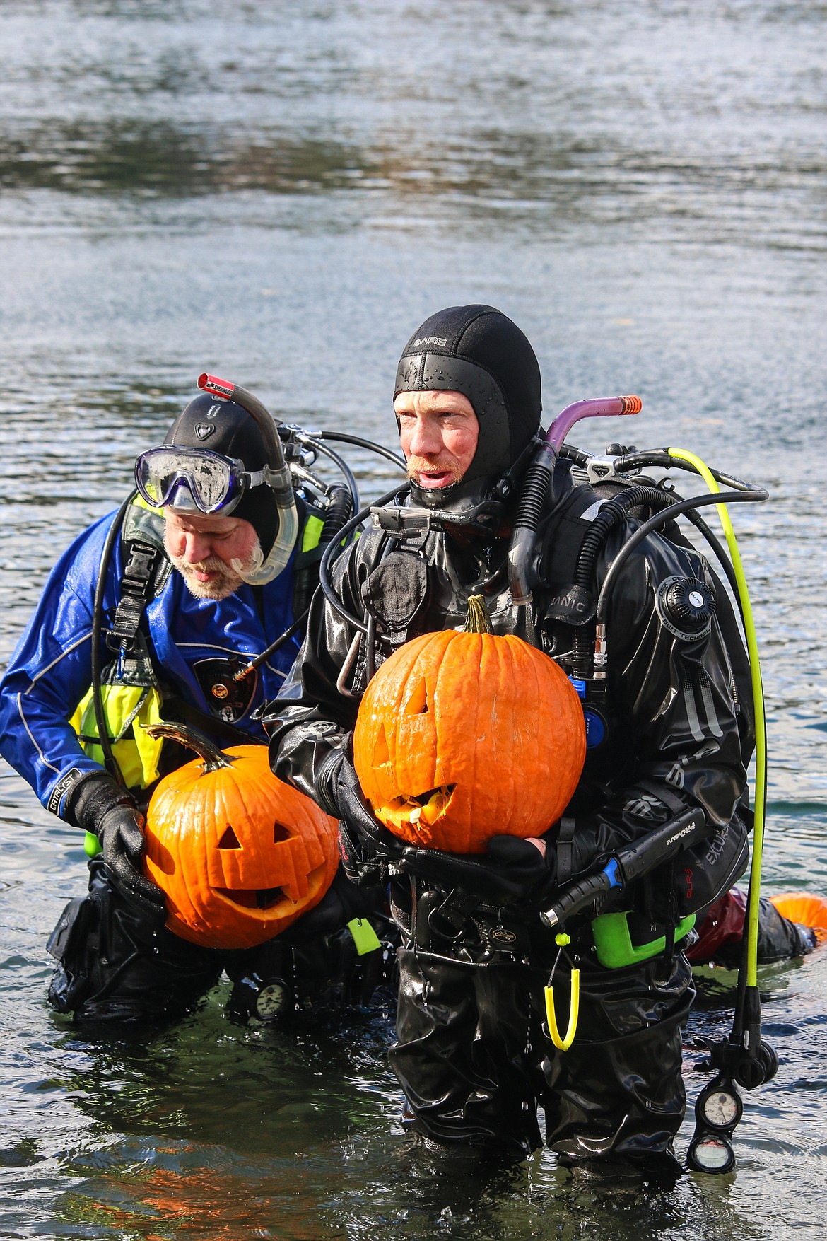 Photo by MANDI BATEMAN
Divers emerge from the depths with their works of art.