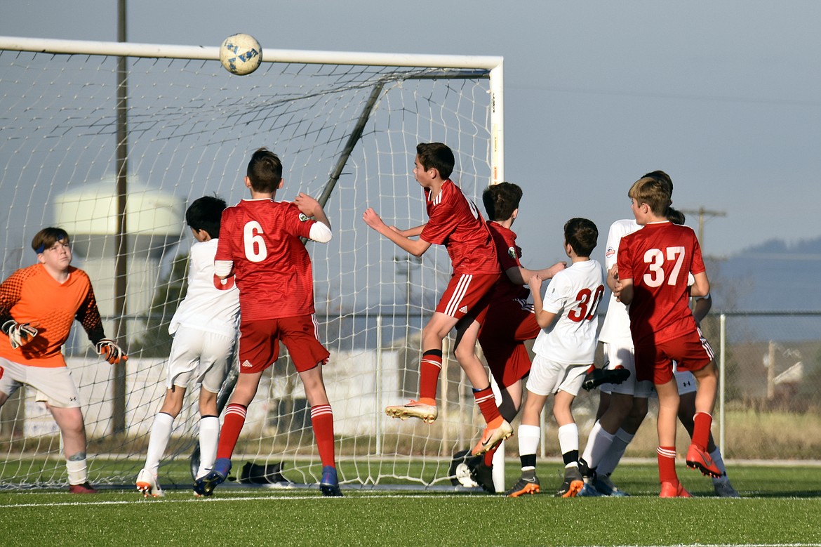 Photo by SUZI ENTZI
The Timbers North FC 06 Boys Red soccer team hosted two games this past weekend. In the first game the Timbers lost 3-2 against Kitsap Alliance FC. Kai Delio and Max Entzi each had one goal for the Timbers, and Gavin Samayoa and Kason Pintler each had an assist. The Timbers&#146; second game ended in a tie 2-2 against Sound FC. Connor Jump had one goal and one assist. Kai Delio had one goal. Braden Latscha was in goal for both Timbers games. Timbers players (in red) from left are Kai Delio, Noah Waddell, Connor Jump and Max Entzi.