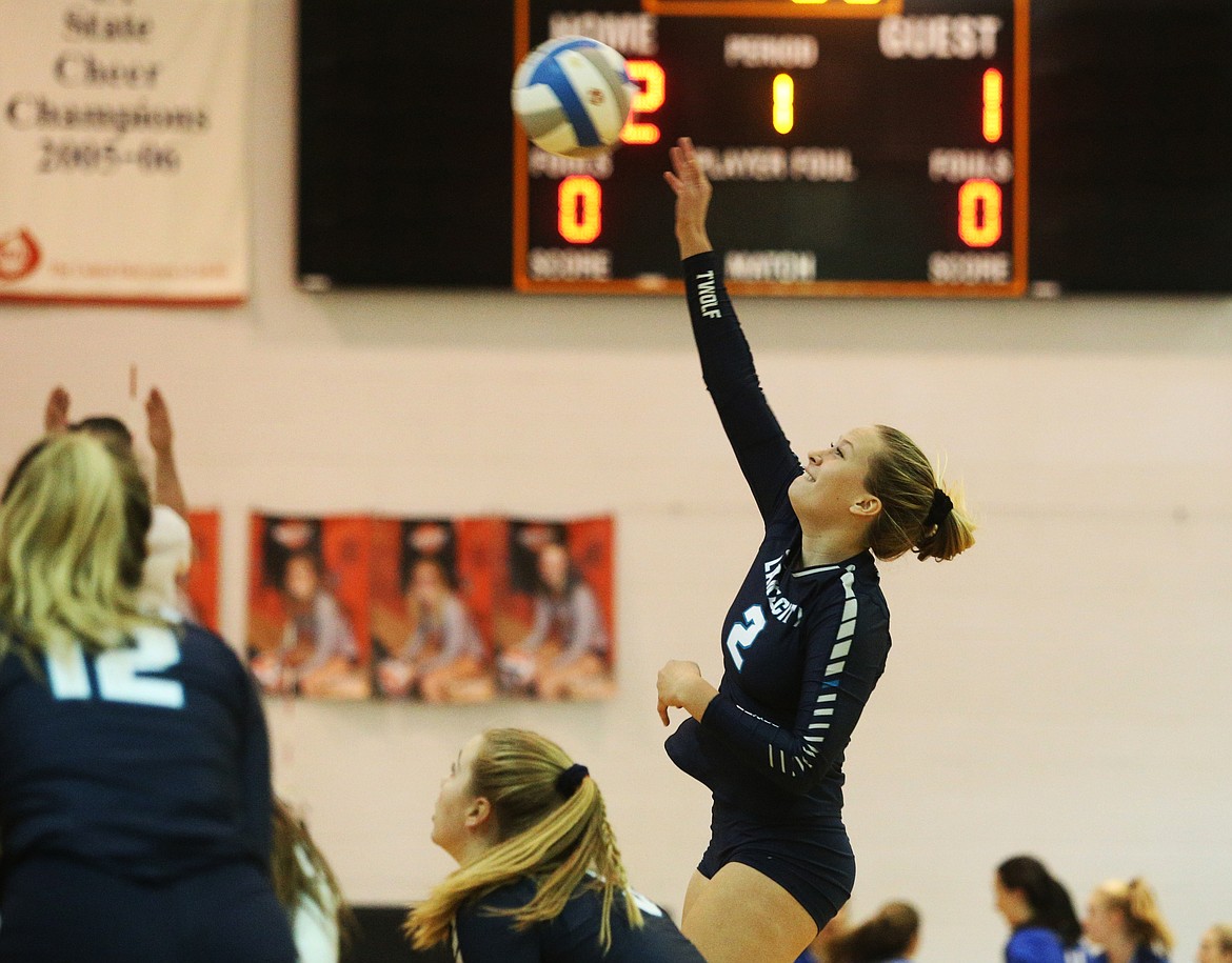 Lake City&#146;s Janae Rayborn hits the ball over the net in an Idaho state 5A volleyball tournament match Friday at Post Falls High School.
LOREN BENOIT/Press