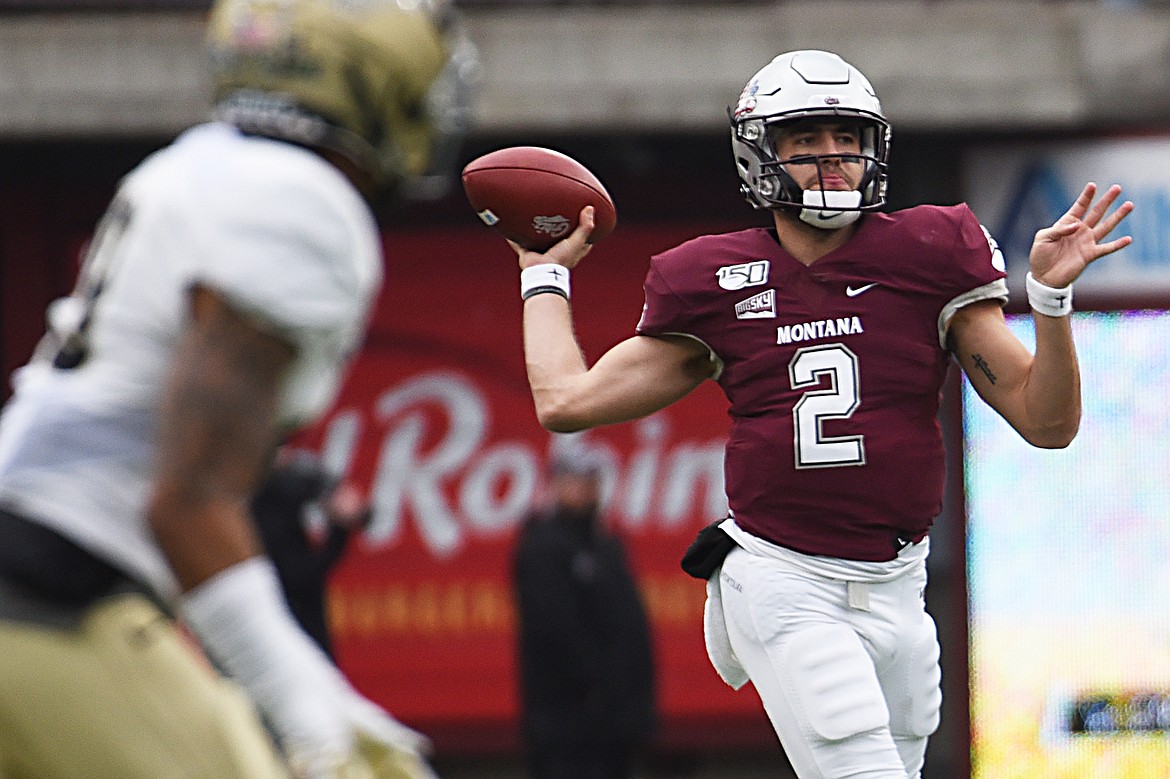 Montana quarterback Cam Humphrey (2) looks to throw in the first quarter against Idaho at Washington-Grizzly Stadium on Saturday. (Casey Kreider/Daily Inter Lake)