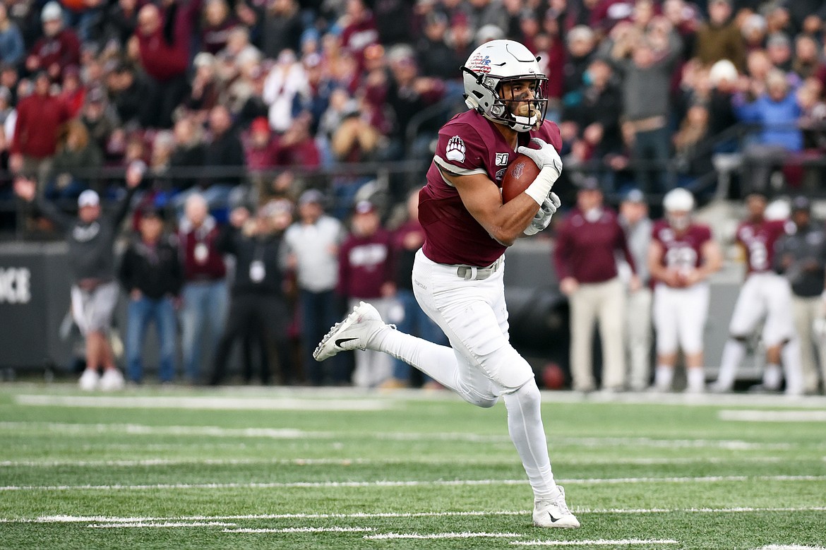 Montana wide receiver Samori Toure (8) heads to the end zone on a 44-yard touchdown reception in the second quarter against Idaho at Washington-Grizzly Stadium on Saturday. (Casey Kreider/Daily Inter Lake)