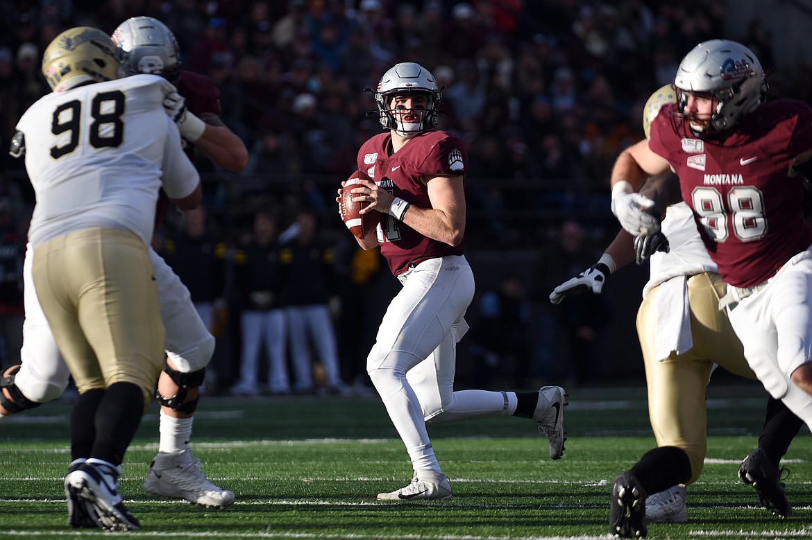 Montana quarterback Dalton Sneed (11) looks to pass in the third quarter against Idaho at Washington-Grizzly Stadium on Saturday. (Casey Kreider/Daily Inter Lake)