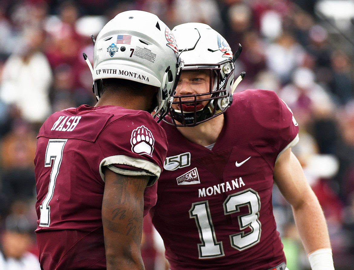 Montana safety Josh Sandry (13) pumps up cornerback Dareon Nash (7) after Nash broke up a pass in the first half against Idaho at Washington-Grizzly Stadium on Saturday. (Casey Kreider/Daily Inter Lake)