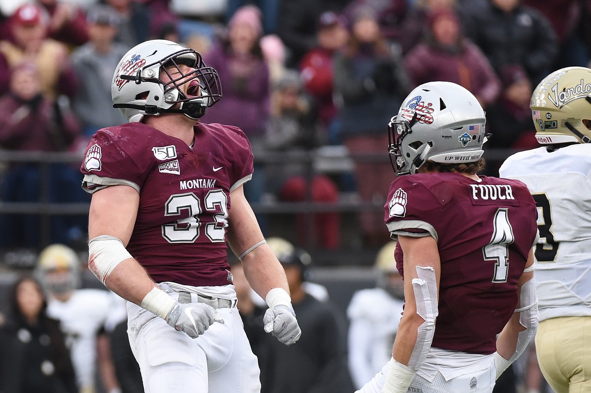 Montana linebacker Dante Olson (34) celebrates after a sack in the second quarter against Idaho at Washington-Grizzly Stadium on Saturday. (Casey Kreider/Daily Inter Lake)