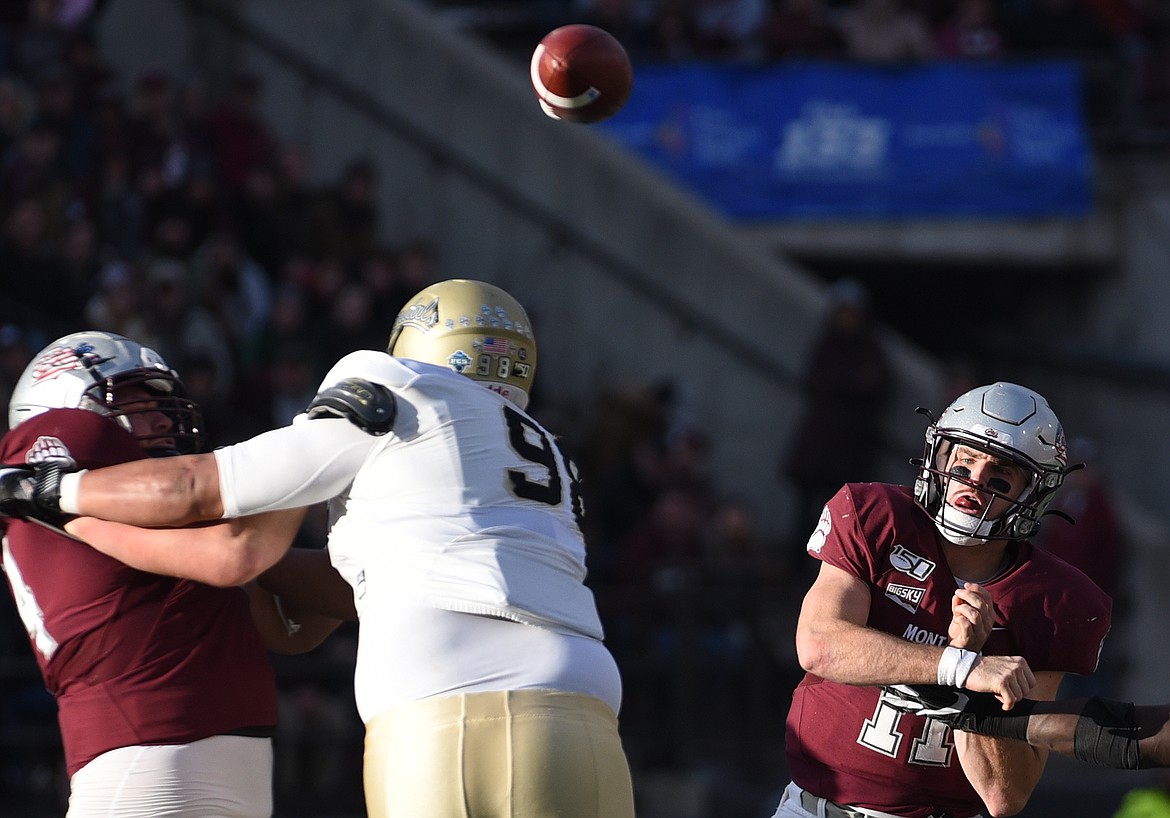 Montana quarterback Dalton Sneed (11) looks to pass in the third quarter against Idaho at Washington-Grizzly Stadium on Saturday. (Casey Kreider/Daily Inter Lake)