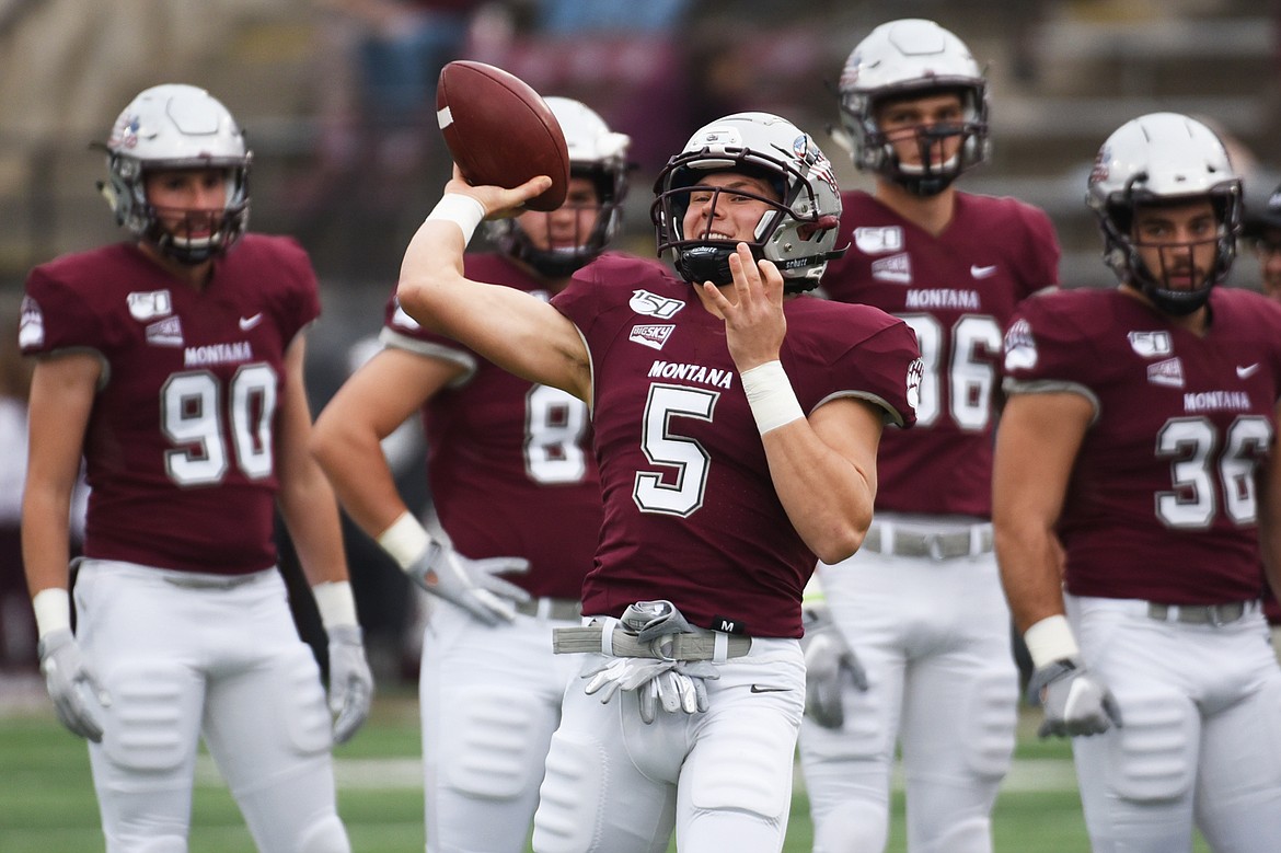 Montana quarterback Garrett Graves (5) warms up before the game against Idaho at Washington-Grizzly Stadium on Saturday. (Casey Kreider/Daily Inter Lake)