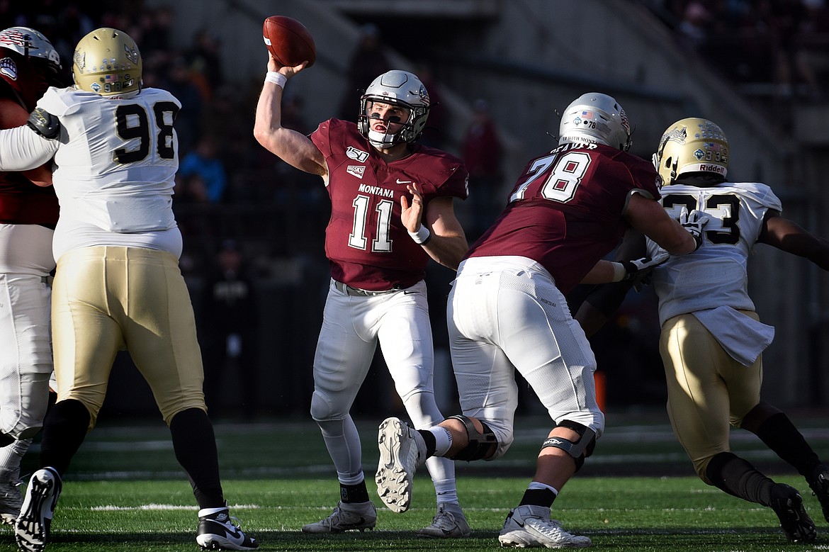 Montana quarterback Dalton Sneed (11) looks to pass in the third quarter against Idaho at Washington-Grizzly Stadium on Saturday. (Casey Kreider/Daily Inter Lake)