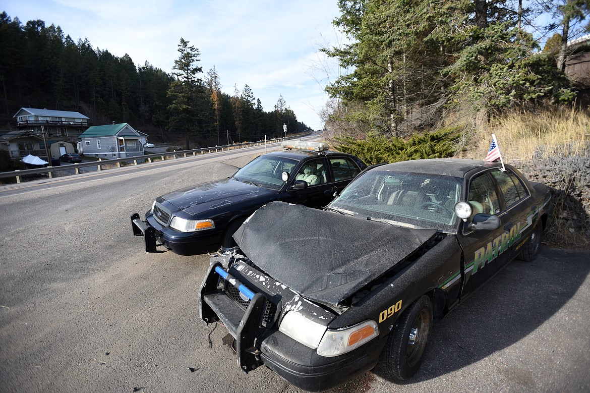 The decoy police car that sits along U.S. 93 near Somers was hit on Monday morning. A new car was brought in to take its place by Tuesday. (Casey Kreider/Daily Inter Lake)