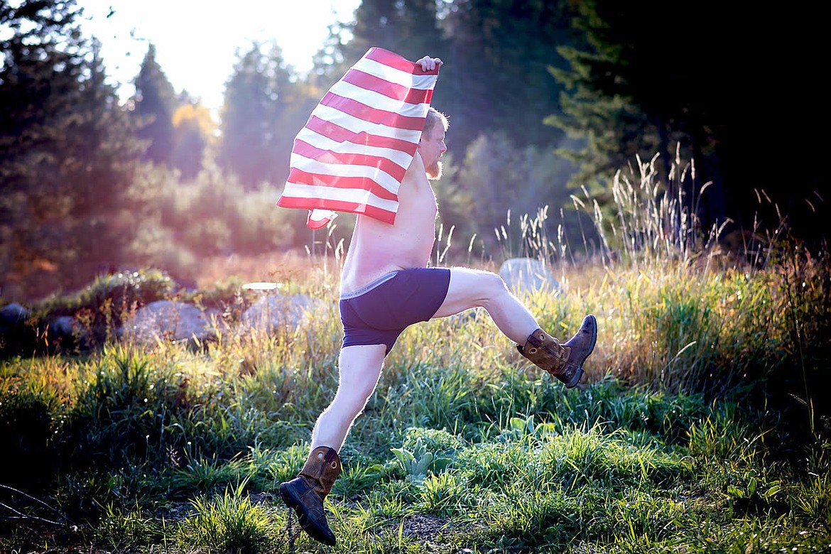 (Photo courtesy TANYIA OULMAN)A participant in the Sandpoint&#146;s Hot and Hairy, 2020 calendar, runs through a field. Sales of the calendar will benefit Community Cancer Services.