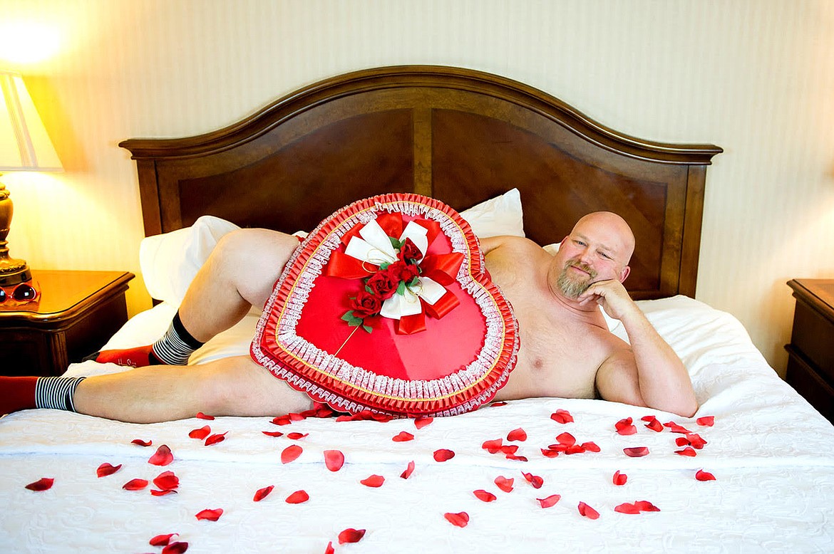 (Photo courtesy TANYIA OULMAN)A participant in the Sandpoint&#146;s Hot and Hairy, 2020 calendar, poses on a bed. Sales of the calendar will benefit Community Cancer Services.