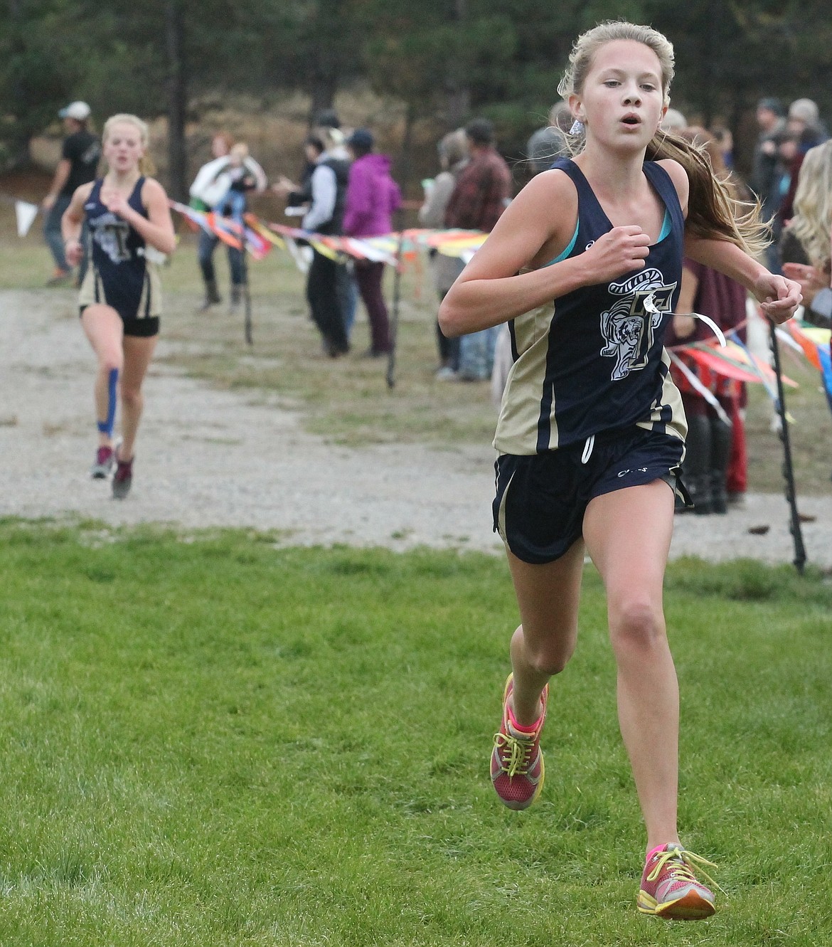 JASON ELLIOTT/Press
Timberlake&#146;s Sarah Zerfas races to the finish line during the 3A District 1 cross country meet on Oct. 24 at Farragut State Park in Athol. Zerfas finished seventh.