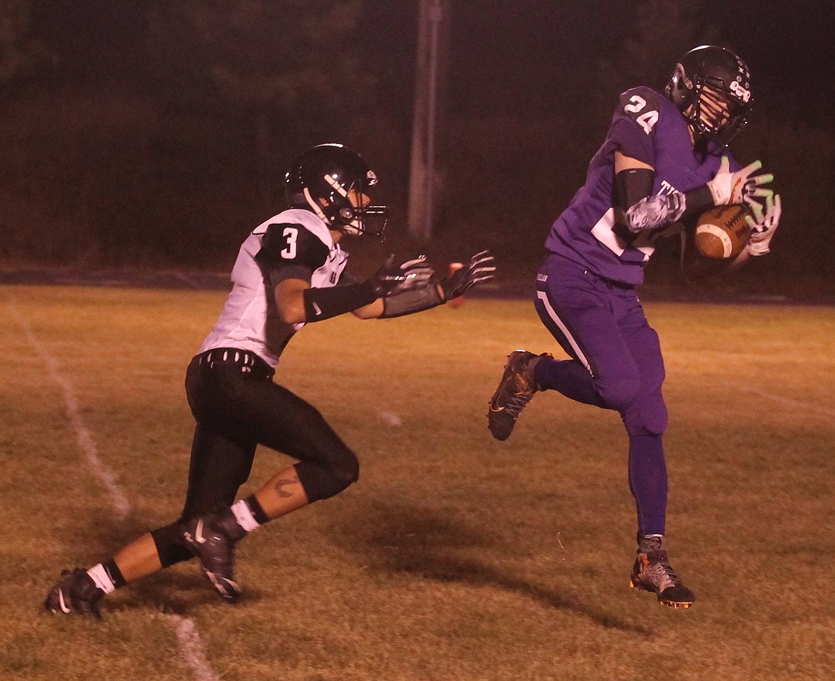 JASON ELLIOTT/Press
Mullan-St. Regis safety Riley Trogden intercepts a Lakeside pass intended for Sonny Reuben to end Tuesday's Kansas tiebreaker to determine the North Star League champion at Kootenai High. Mullan will host Kendrick in the state 1A Division II quarterfinals on Saturday at 1 p.m.