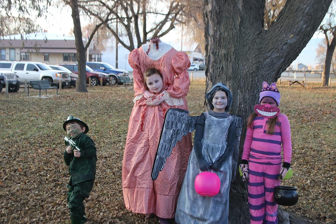 Halloween revelers, from left, are Gavin Brown, Teirainy Bellinger, Tia Bellinger, Kiara Brown. (Lisa Larson/Valley Press)