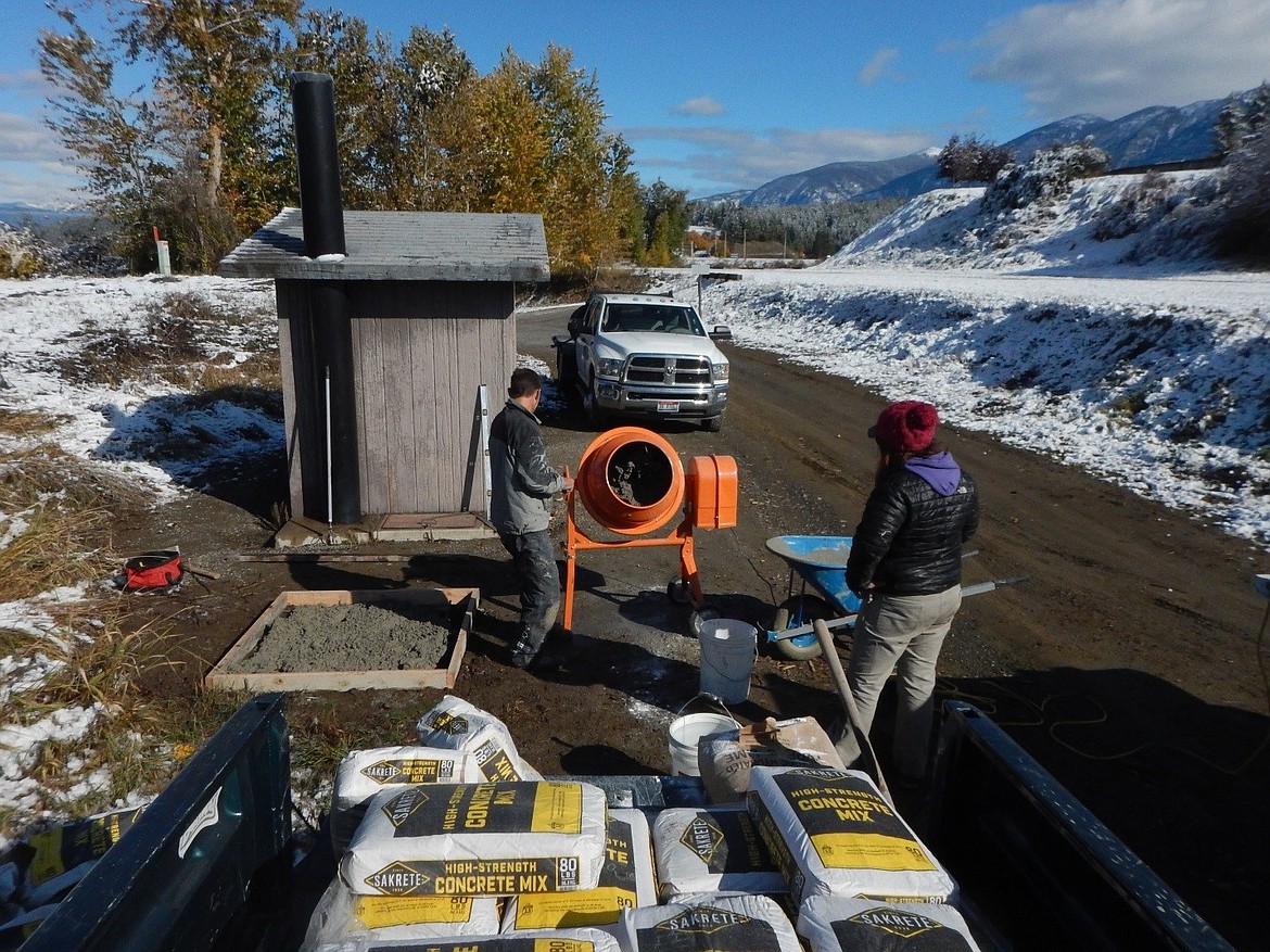 Brandon Diller and Kina Wasmer mixing concrete for the slab at the Porthill boat ramp.