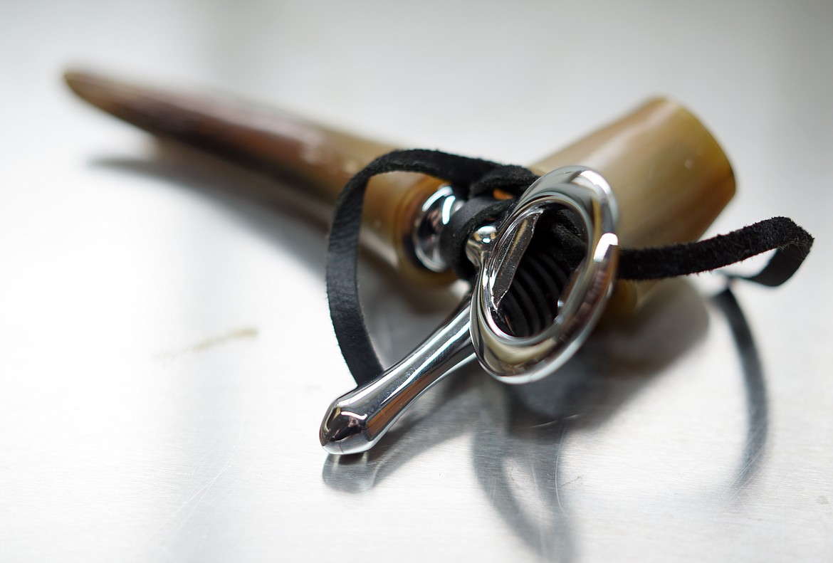 A single horn tip was used to create this bottle stopper and bottle opener set.