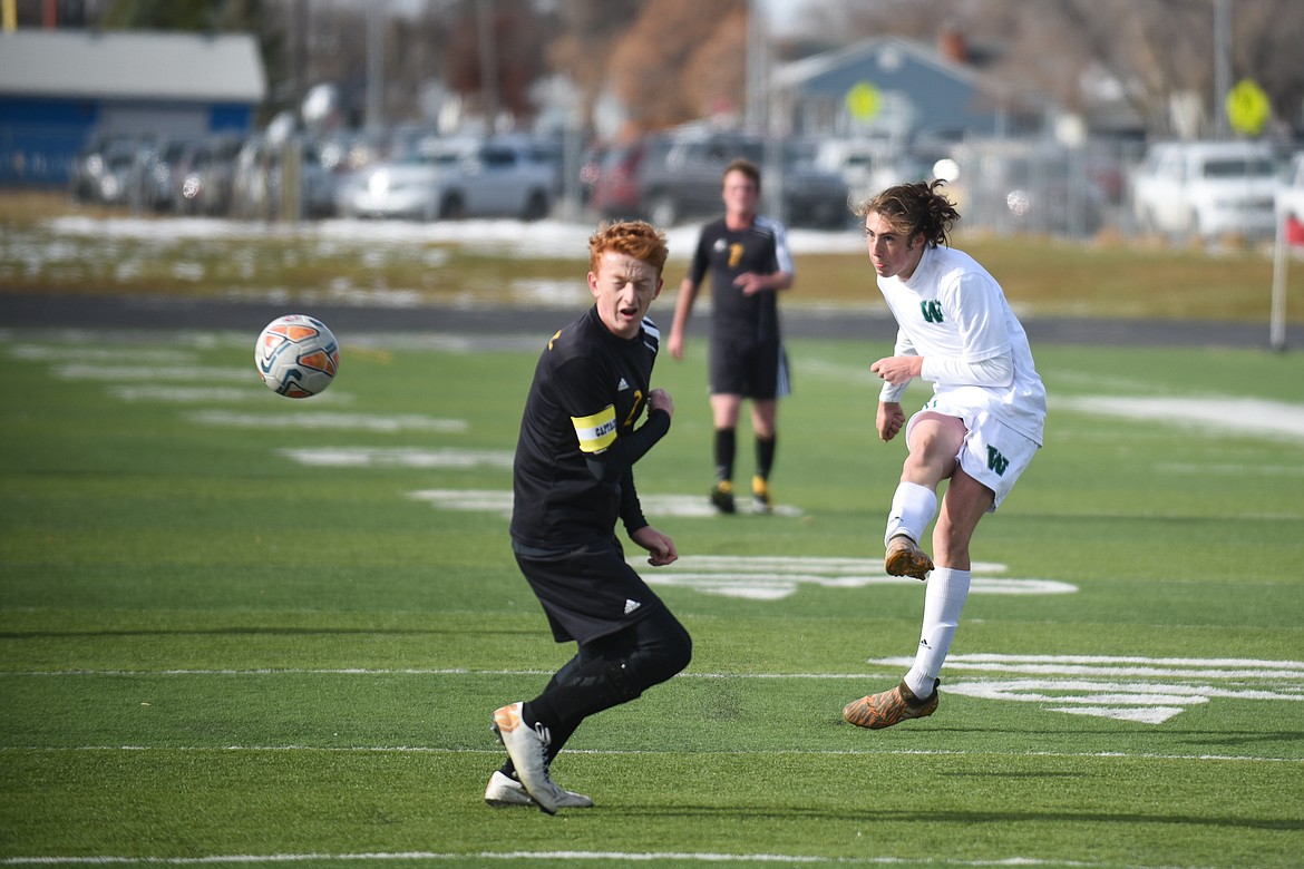 James Thompson rockets the ball during the Bulldogs&#146; 4-0 state title win over Laurel. (Daniel McKay/Whitefish Pilot)