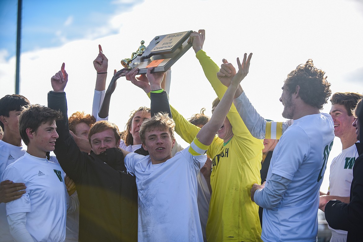 The Bulldogs host their second straight trophy after their 4-0 state title win over Laurel . (Daniel McKay/Whitefish Pilot)