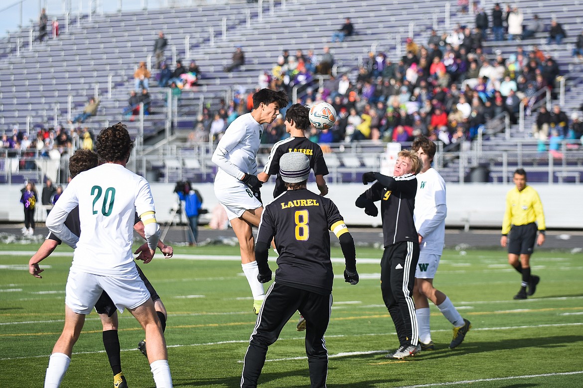 Brandon Mendoza skies for the header during the Bulldogs&#146; 4-0 state title win over Laurel . (Daniel McKay/Whitefish Pilot)