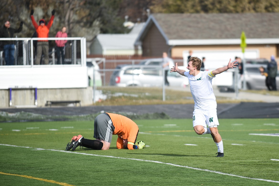 Casey Schneider celebrates after scoring a goal during the Bulldogs&#146; 4-0 state title win over Laurel. (Daniel McKay/Whitefish Pilot)