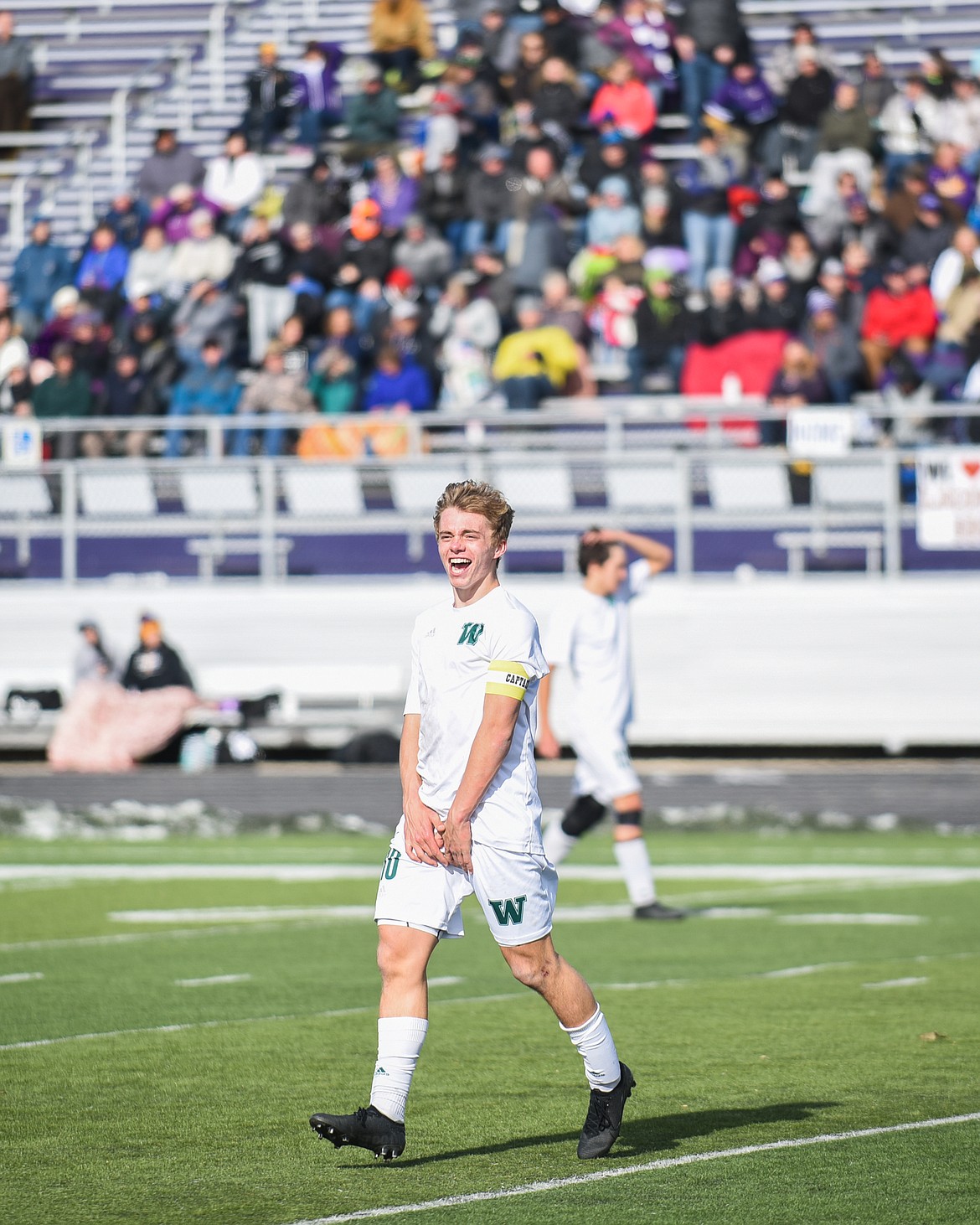 Casey Schneider celebrates after time expires during the Bulldogs&#146; 4-0 state title win over Laurel . (Daniel McKay/Whitefish Pilot)