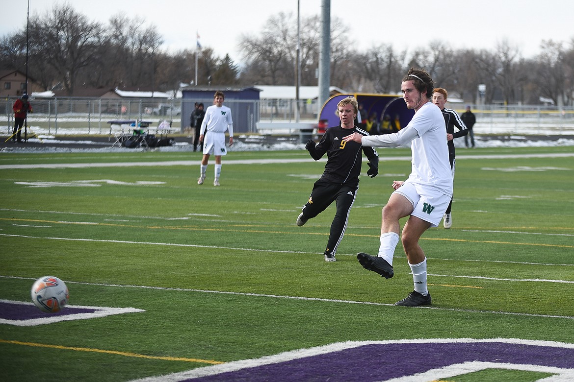 Sam Menicke fires the second goal of the game during the Bulldogs&#146; 4-0 state title win over Laurel . (Daniel McKay/Whitefish Pilot)