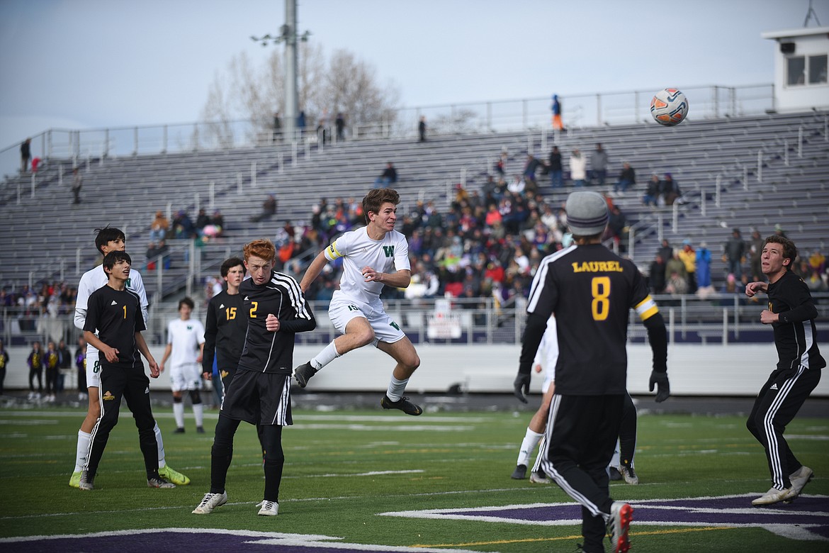 Joseph Houston hits a header off a corner kick during the Bulldogs&#146; 4-0 state title win over Laurel . (Daniel McKay/Whitefish Pilot)