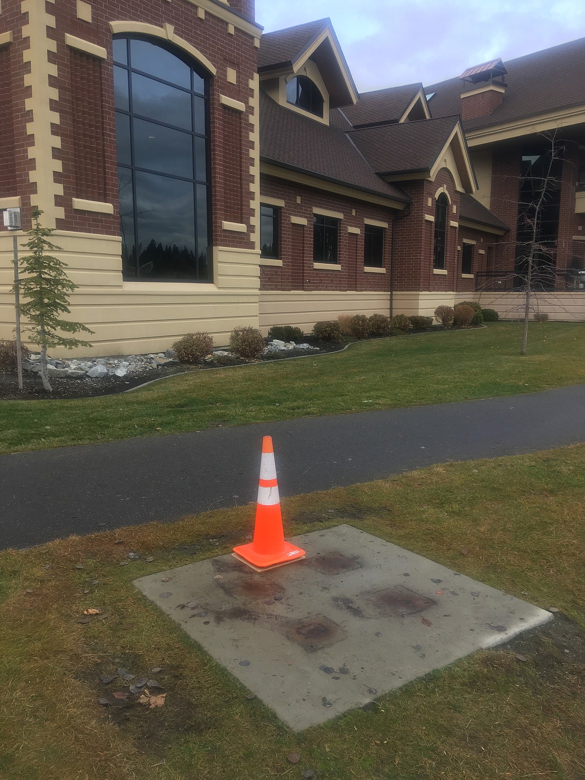 The sculpture Marker #11 was removed Monday at Riverstone Park and replaced with an orange caution cone by crews from the City of Coeur d&#146;Alene. (LOREN BENOIT/Press)