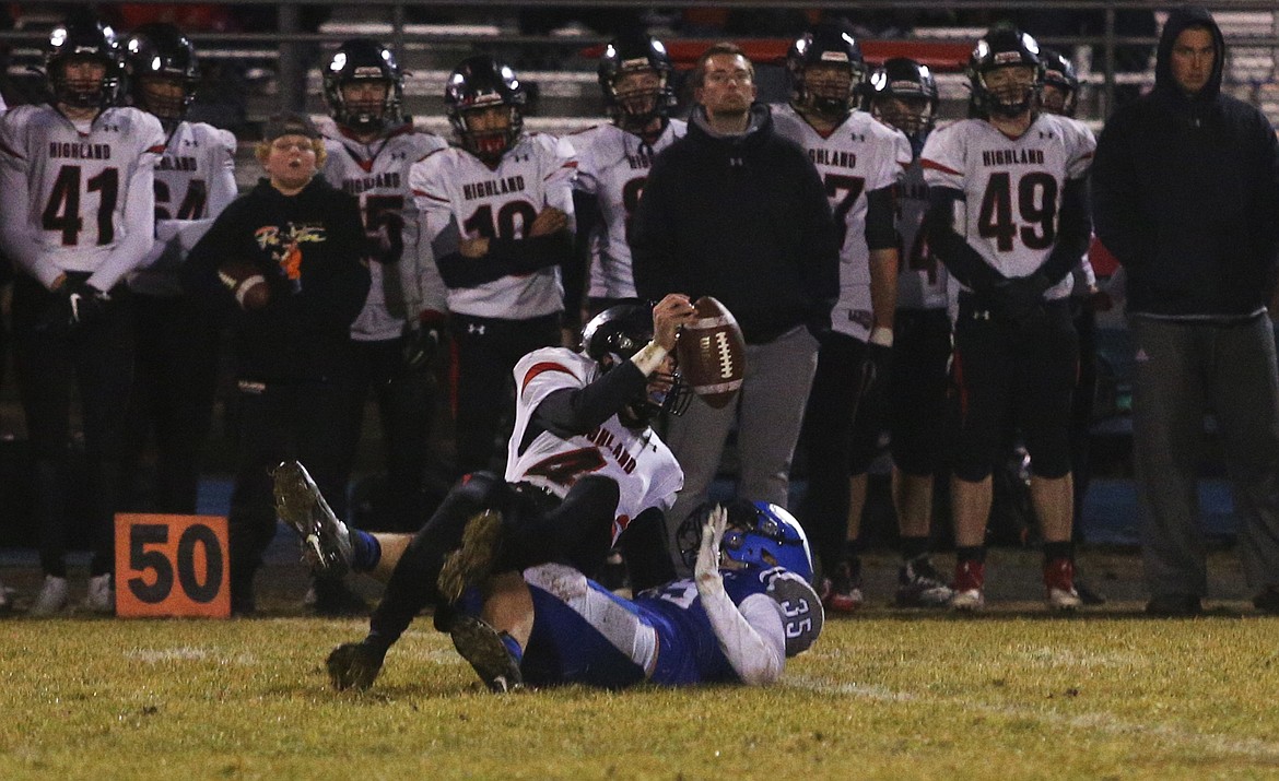 Coeur d&#146;Alene&#146;s Mason Cummings sacks Easton Durham during Friday night&#146;s semifinal game at Viking Field.(LOREN BENOIT/Press)