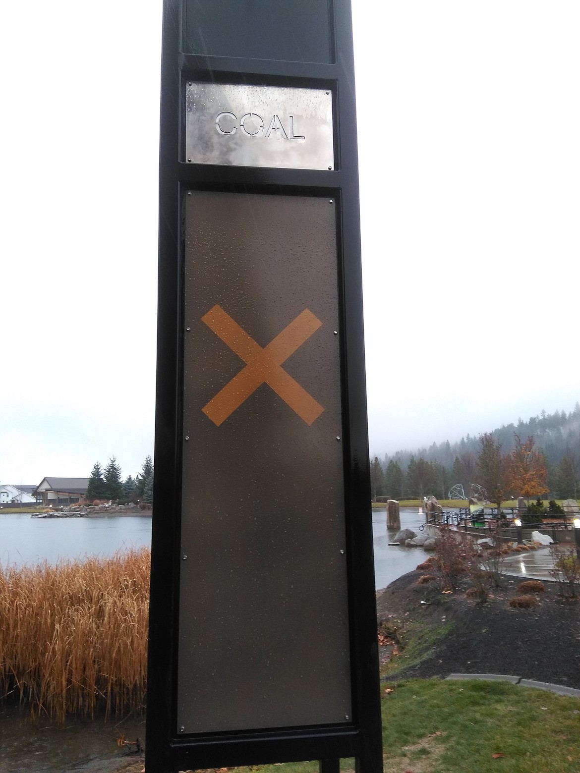 Marker 11, a work by John Zylstra and selected by the Coeur d'Alene Arts Commission for display until September 2020, supposedly comments on coal manufacturing. Each side of the cubed artwork features a frame of a symbol and it's native translation of the word &quot;COAL.&quot; The American panel has a red X below &quot;COAL;&quot; it's Russian counterpart features a hammer and sickle. A local activist points to the Soviet symbol as evidence of a global conspiracy toward socialism. (CRAIG NORTHRUP/Press)