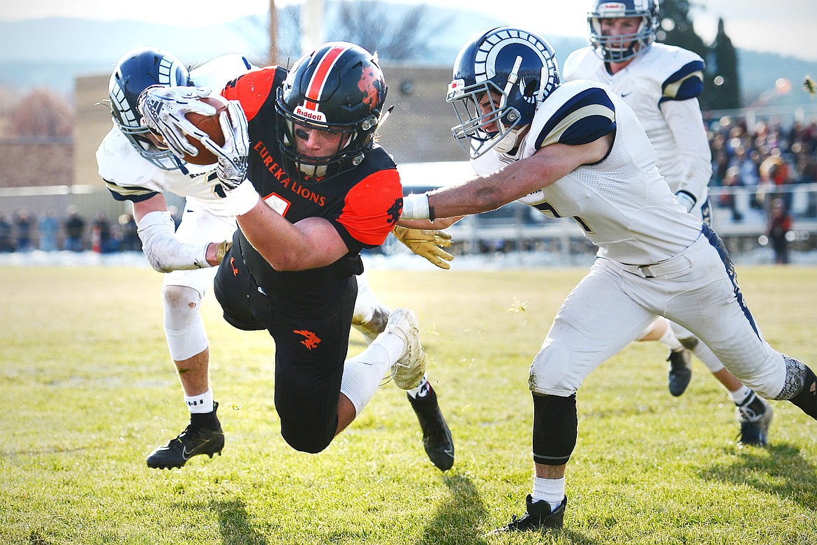 Eureka running back Chet McCully dives for the end zone on a 3-yard touchdown run in the second quarter against Red Lodge in the State Class B semifinal at Lincoln County High School in Eureka on Saturday. Eureka won, 39-35. (Casey Kreider/Daily Inter Lake)