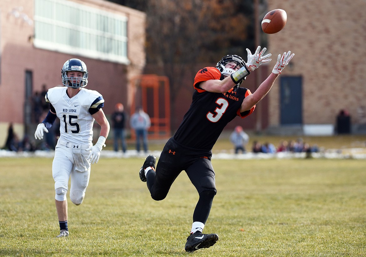 Eureka wide receiver AJ Pacella (3) pulls in an over-the-shoulder reception in the second quarter against Red Lodge in the State Class B semifinal at Lincoln County High School in Eureka on Saturday. Eureka won, 39-35. (Casey Kreider/Daily Inter Lake)