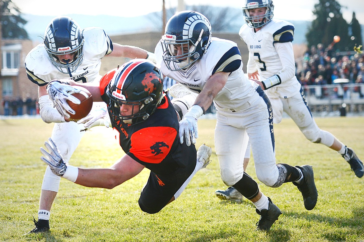 Eureka running back Chet McCully dives for the end zone on a 3-yard touchdown run in the second quarter against Red Lodge in the State Class B semifinal at Lincoln County High School in Eureka on Saturday. Eureka won, 39-35. (Casey Kreider/Daily Inter Lake)