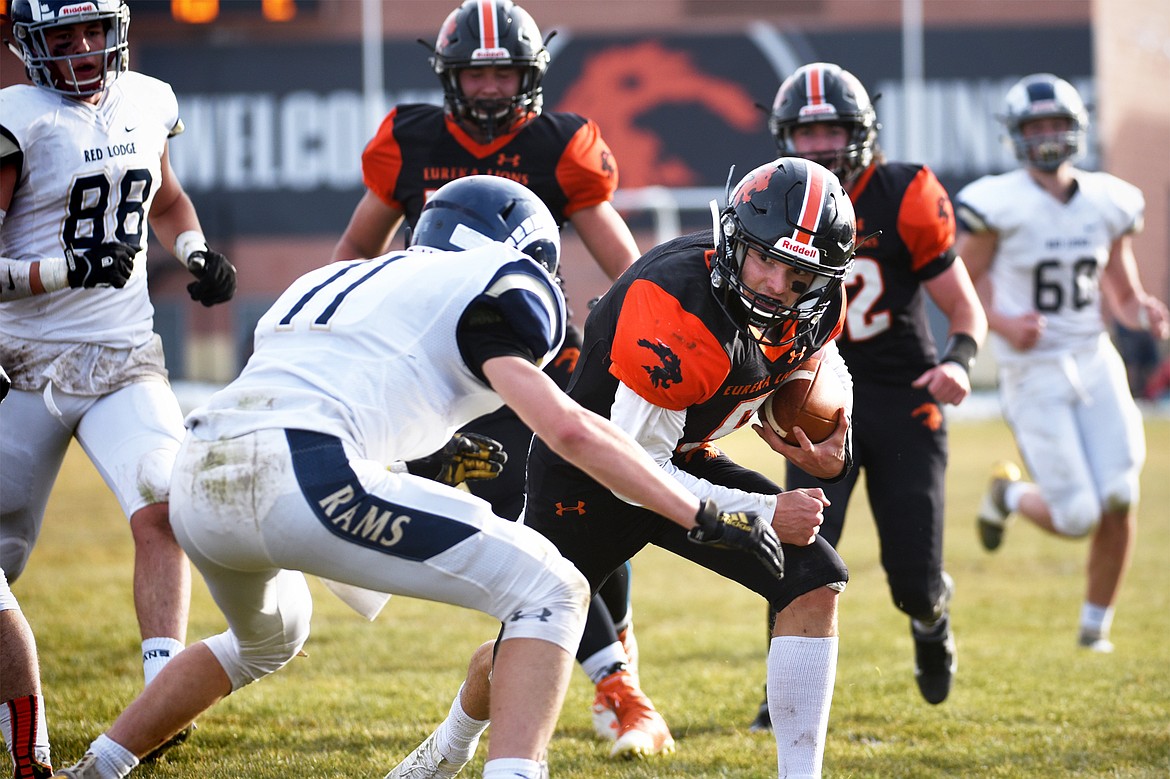 Eureka quarterback Hank Dunn (5) scores on a 2-yard touchdown run in the second quarter against Red Lodge in the State Class B semifinal at Lincoln County High School in Eureka on Saturday. Eureka won, 39-35. (Casey Kreider/Daily Inter Lake)