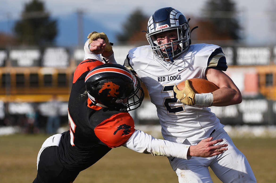 Red Lodge running back Jay Jetmore (2) gets to the outside against Eureka in the State Class B semifinal at Lincoln County High School in Eureka on Saturday. Eureka won, 39-35. (Casey Kreider/Daily Inter Lake)