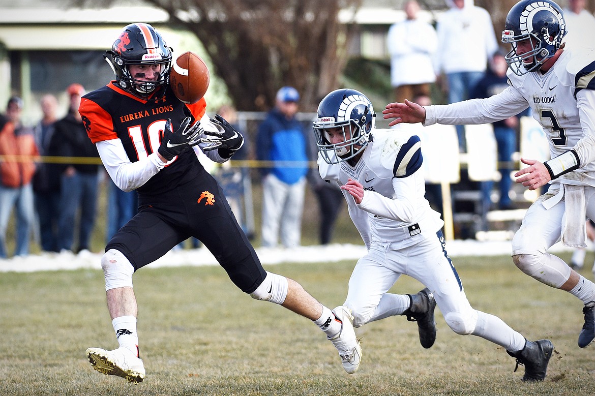 Eureka wide receiver Austin Sartori (10) catches a 42-yard touchdown reception in the third quarter against Red Lodge in the State Class B semifinal at Lincoln County High School in Eureka on Saturday. Eureka won, 39-35. (Casey Kreider/Daily Inter Lake)