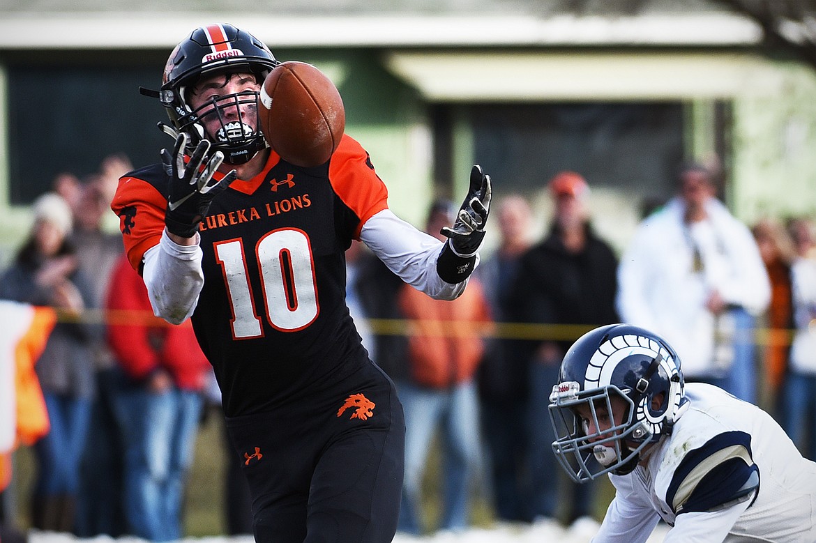 Eureka wide receiver Austin Sartori (10) catches a 42-yard touchdown reception in the third quarter against Red Lodge in the State Class B semifinal at Lincoln County High School in Eureka on Saturday. Eureka won, 39-35. (Casey Kreider/Daily Inter Lake)