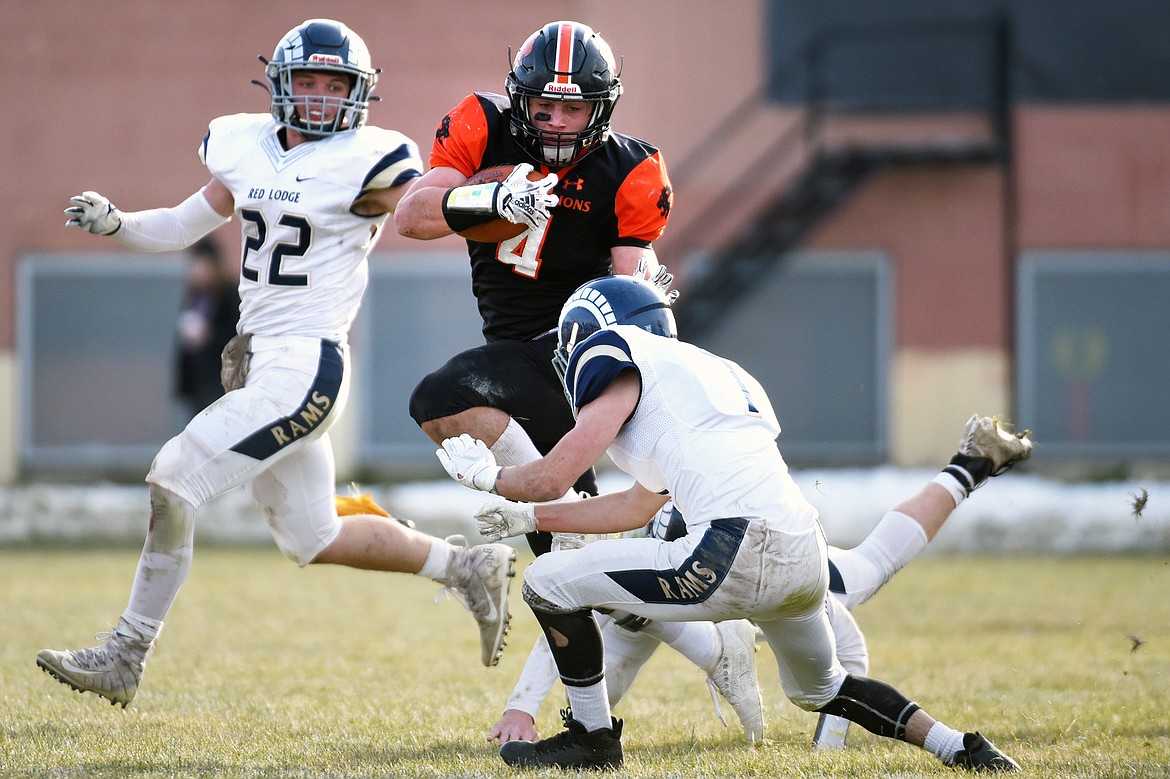 Eureka running back Chet McCully (4) looks for room to run in the second quarter against Red Lodge in the State Class B semifinal at Lincoln County High School in Eureka on Saturday. Eureka won, 39-35. (Casey Kreider/Daily Inter Lake)