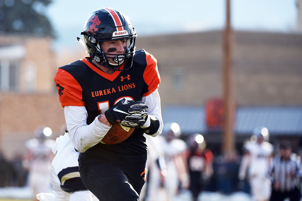 Eureka wide receiver Austin Sartori (10) catches a 34-yard touchdown reception in the third quarter against Red Lodge in the State Class B semifinal at Lincoln County High School in Eureka on Saturday. Eureka won, 39-35. (Casey Kreider/Daily Inter Lake)