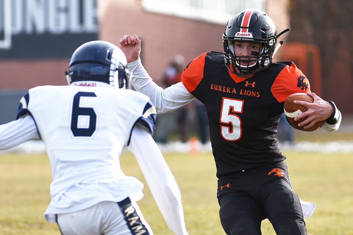 Eureka quarterback Hank Dunn (5) scores on a 2-yard touchdown run in the second quarter against Red Lodge in the State Class B semifinal at Lincoln County High School in Eureka on Saturday. Eureka won, 39-35. (Casey Kreider/Daily Inter Lake)