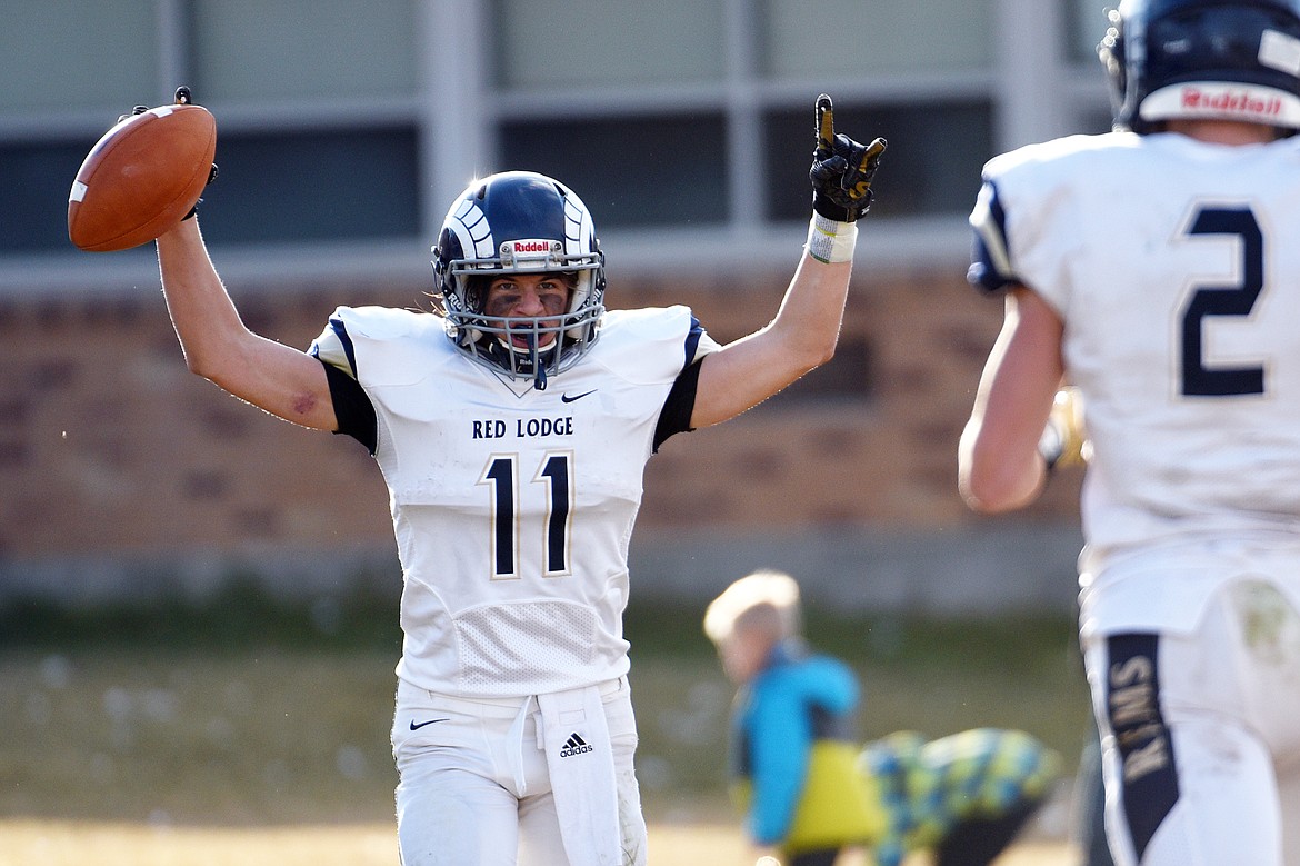 Red Lodge wide receiver Braden Tomlin (11) celebrates after a 35-yard touchdown reception in the third quarter against Eureka in the State Class B semifinal at Lincoln County High School in Eureka on Saturday. Eureka won, 39-35. (Casey Kreider/Daily Inter Lake)