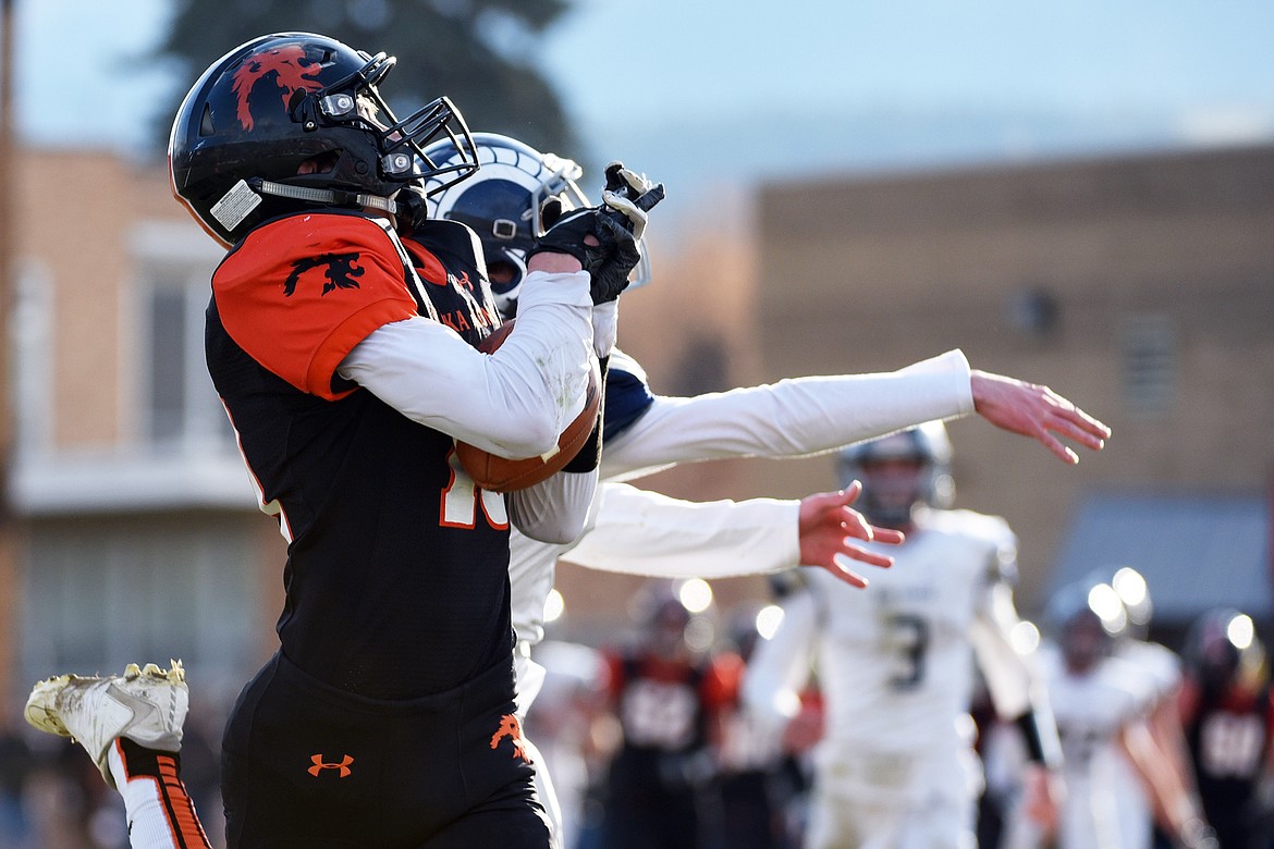 Eureka wide receiver Austin Sartori (10) catches a 34-yard touchdown reception in the third quarter against Red Lodge in the State Class B semifinal at Lincoln County High School in Eureka on Saturday. Eureka won, 39-35. (Casey Kreider/Daily Inter Lake)